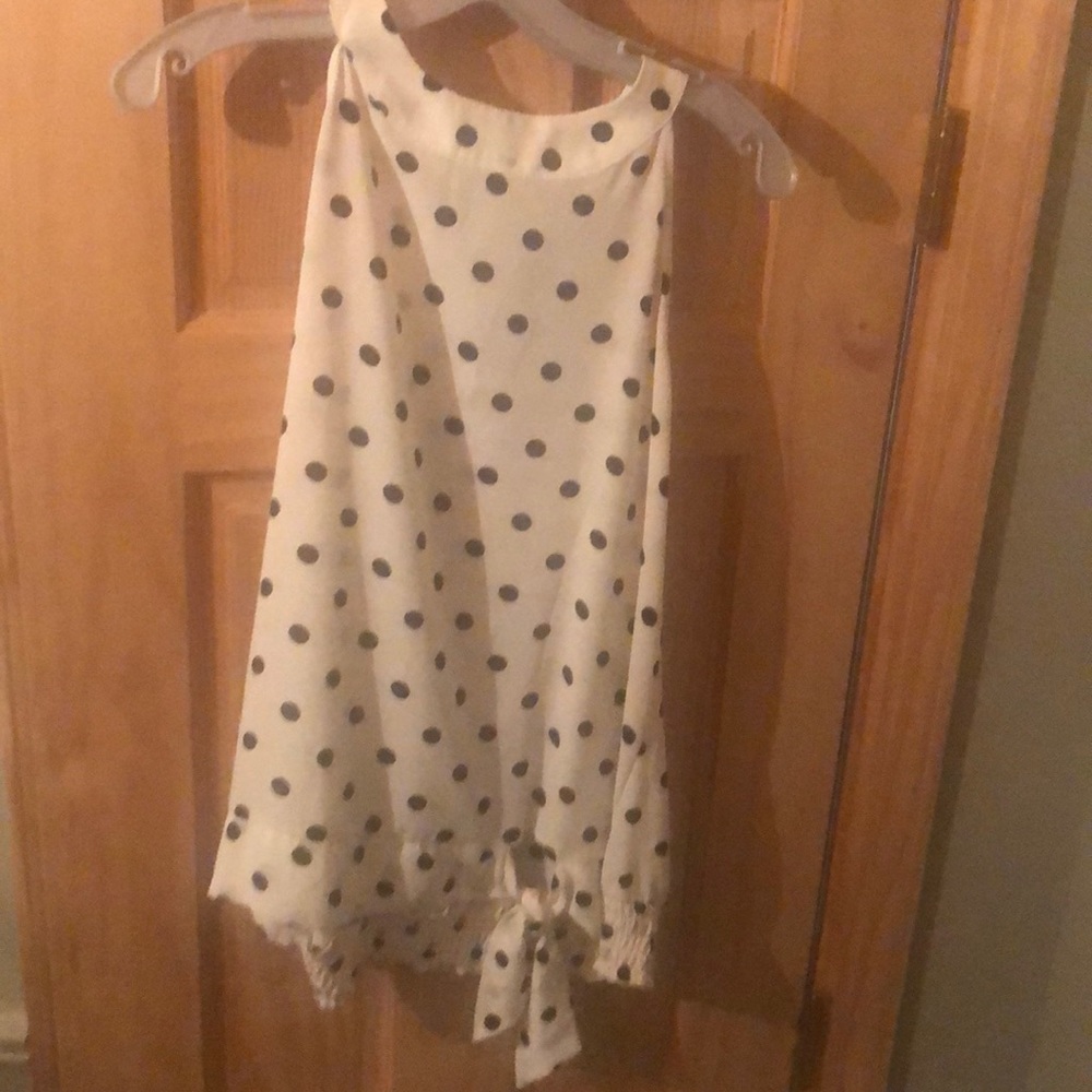 Sleeveless polka dot blouse